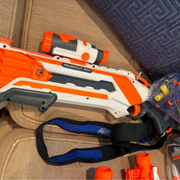 Nerf Arsenal, darts, goggles, mags, and multiple types of guns and attacments. - Picture 8 of 9